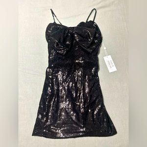 Stunning mini dress by Ronny Kobo designer